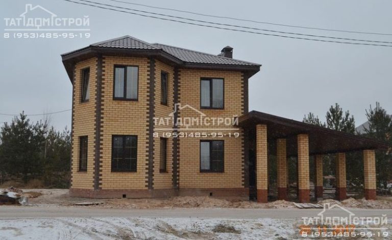Кирпичный коттедж 155м² с навесом под машину